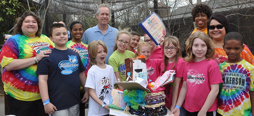 Earth Day Celebration at the Louisville Zoo with mayor fischer, group of boys and girls with counselors and zoo volunteers for earth day