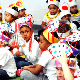 PNC Grant - group of boys and girls wearing hats they made for an event at the zoo