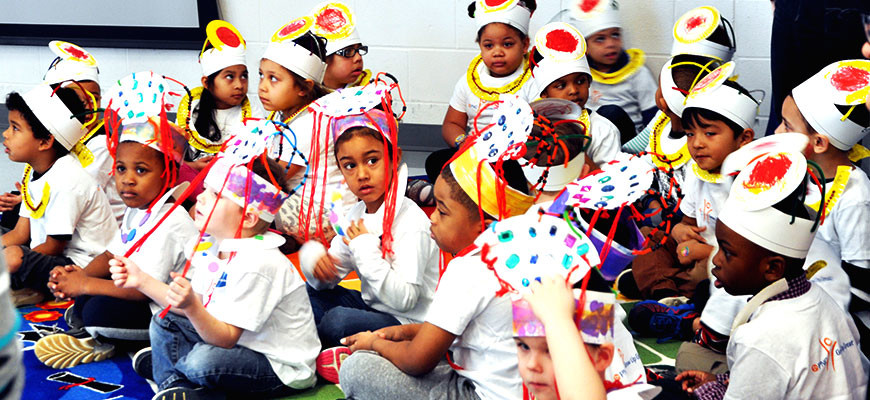 PNC Grant - group of boys and girls wearing hats they made for an event at the zoo