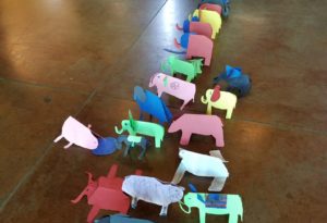 photo - zoodunnit elephants, made by children attending zoo day camp, multi color elephants made from colored paper