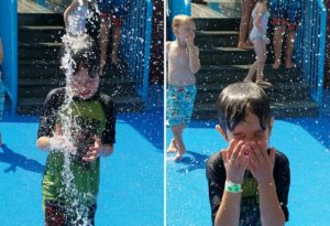 photo - split screen shot of boy getting sprayed by water spouts while in splash park, at lou zoo water park