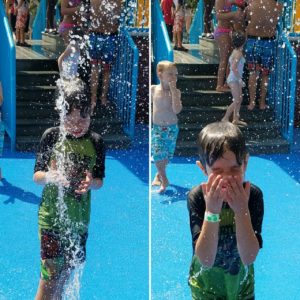 photo - split screen shot of boy getting sprayed by water spouts while in splash park, at lou zoo water park