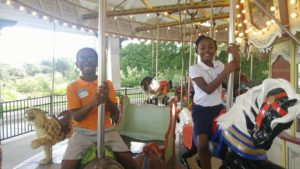 Cane Run students ride the carousel
