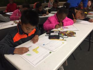 paupin students color with crayon