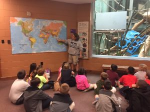 wilt students look at world map