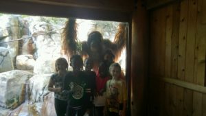 maupin students stand in front of orangutan