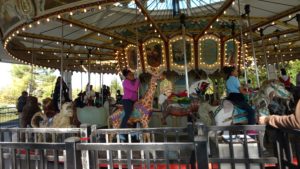roosevelt perry students ride merry go round