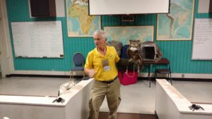 zookeeper holds owl