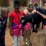 roosevelt perry students pet black goat