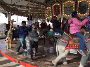 Cochran students ride the merry go round