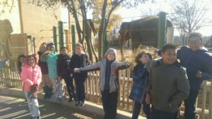 Goldsmith students stand in front of elephant exhibit