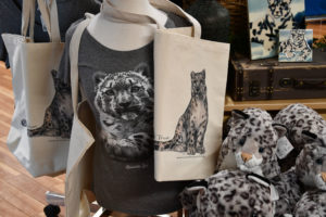 photo - snow leopard gifts you can purchase from gift shop - t shirts, plush animals, prints, carry all bags