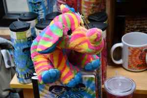 photo - 50th anniversary multi colored plus animal, with tumblers, coffee cups, notebooks you can purchase at the gift shop