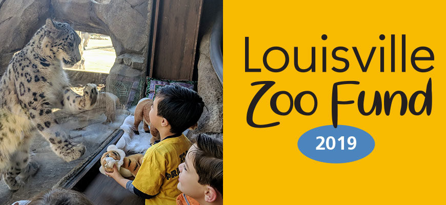 banner - l/side is snow leopard looking at visitors thru glass enclosure space, r/side Louisville Zoo Fund, blue oval 2019