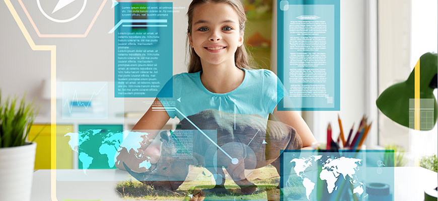 photo - of young female student working, at her desk, on a display of computer graphics, showing maps, information sheets, with rhino imagine also projected on screen