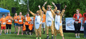 Group dressed as giraffes for throo the zoo