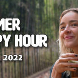 banner - Summer Happy Hour, July 27,2022 with female visitor holding drink with big smile on her face, background is blurred fencing,trees