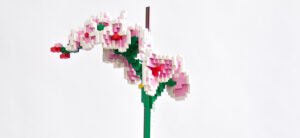 graphic of Lego pink/white flowers on green stem