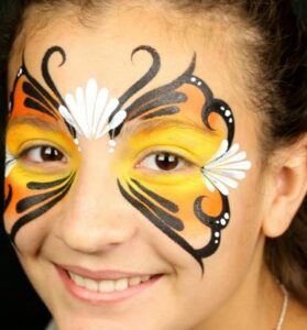 graphic of face painting of butterflies with flowers